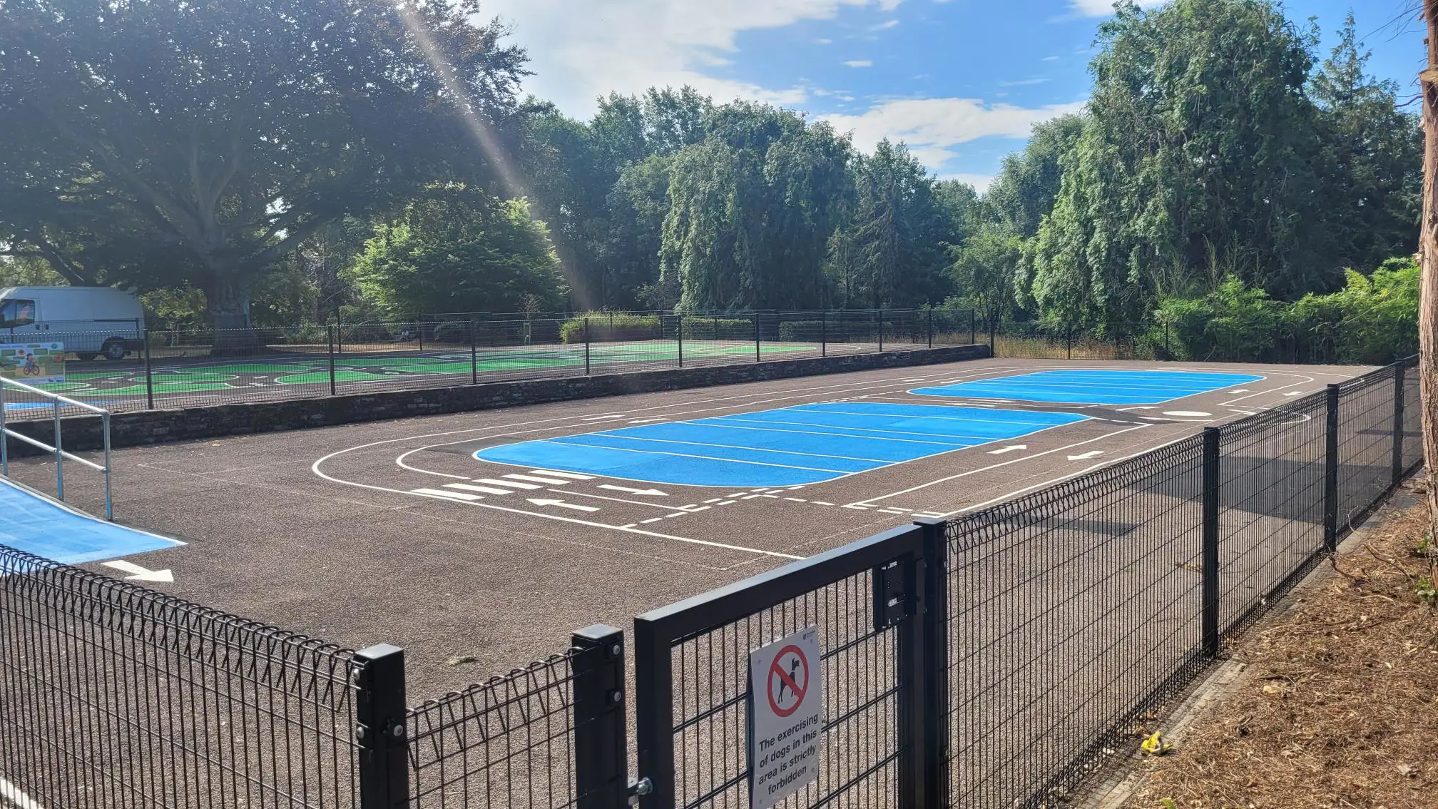 Blue area of Cycle Skills Circuit with lane markings