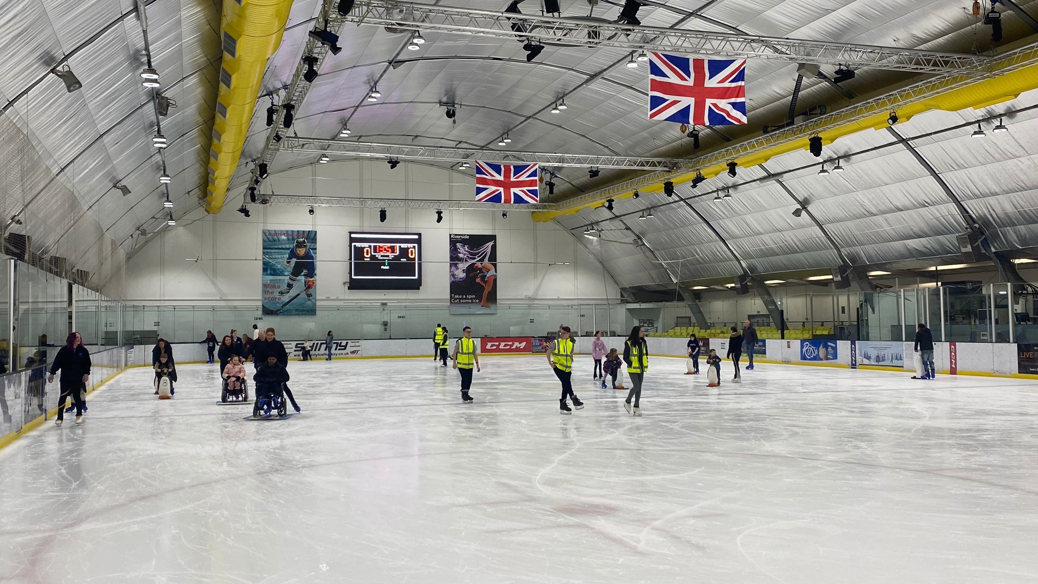 A group of people learning to ice skate preview