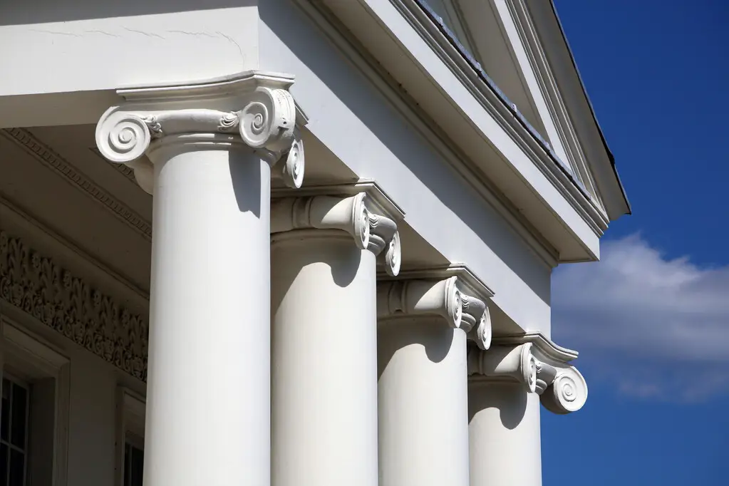 Four white Ionic columns at front of Hylands House
