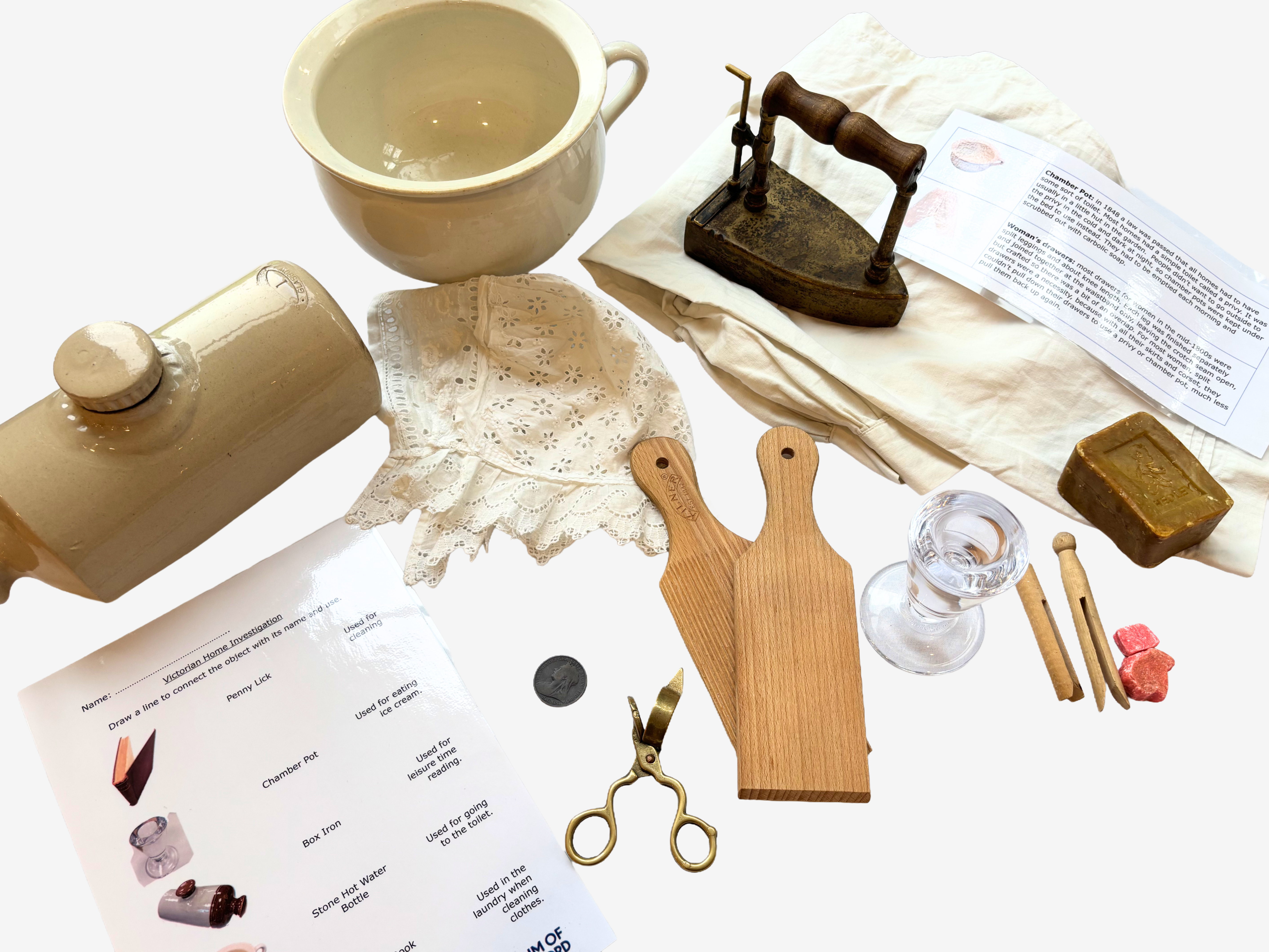 Victorian Home items including laundry and clothes making tools, an iron, pot and worksheets