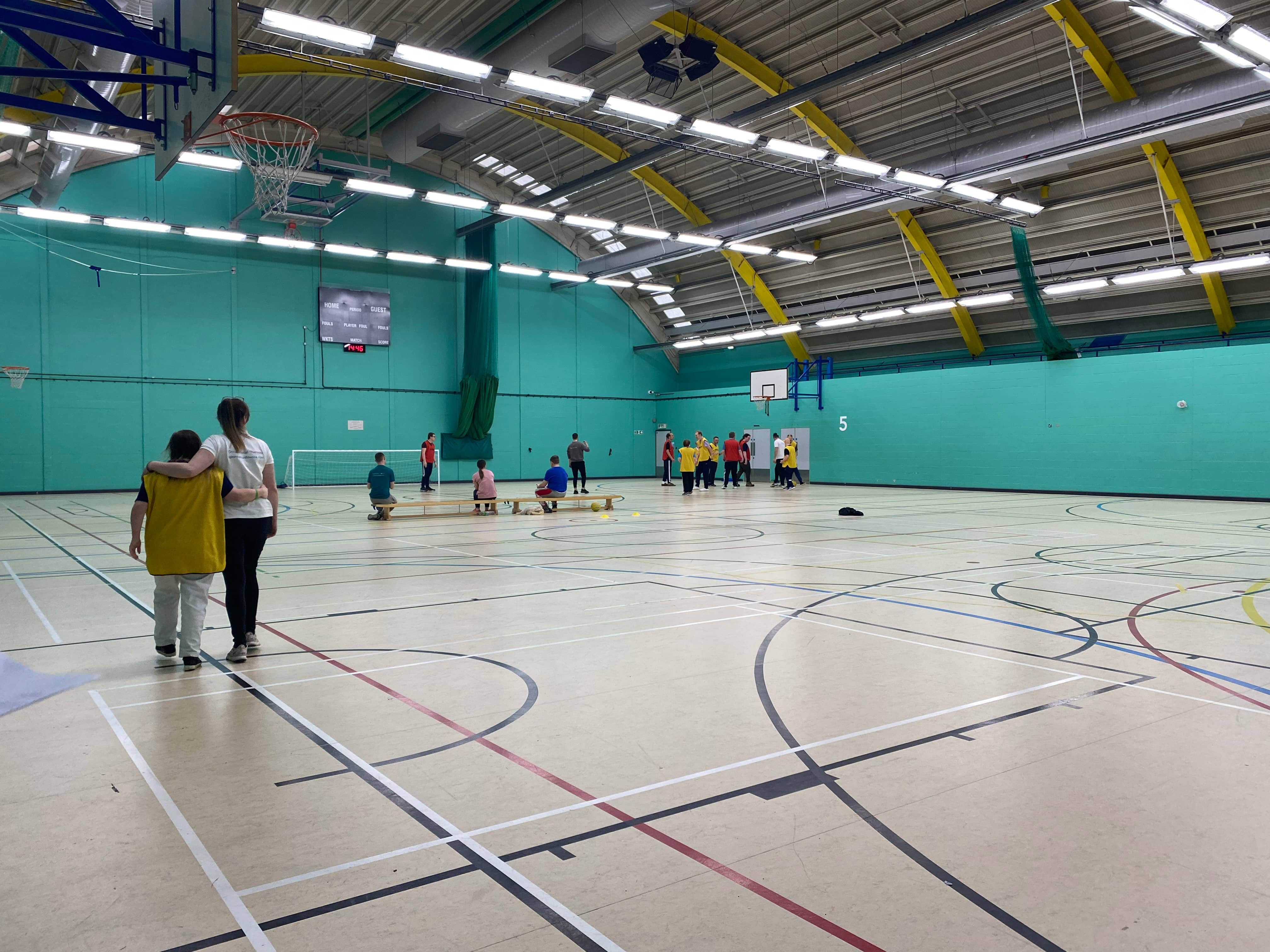 Multiple sports being played in a sports hall preview