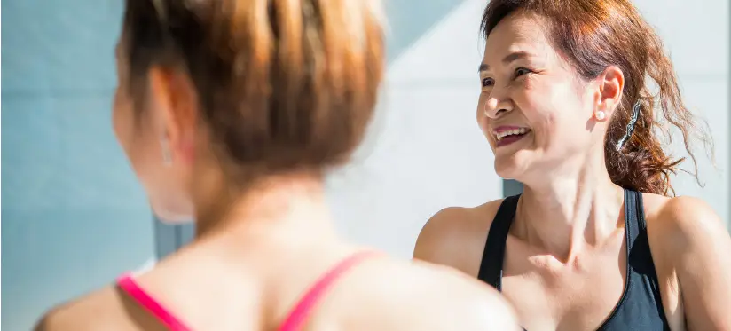 Two ladies take part in an over 50s class