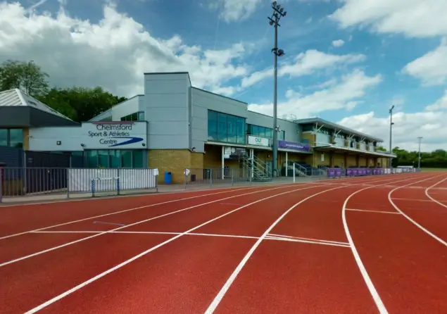Red athletics track overlooked by the centre