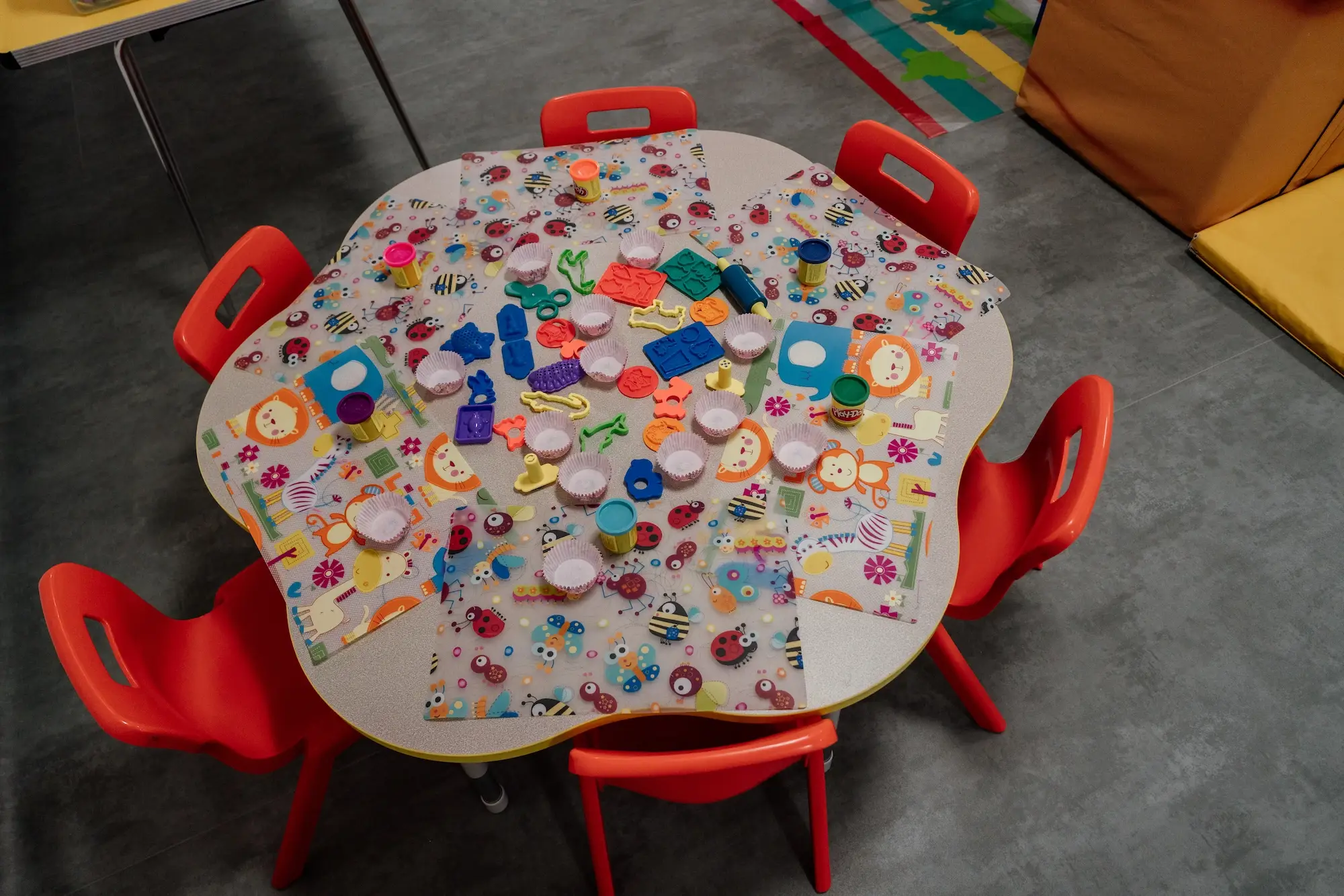 Small round table laid out for craft activity